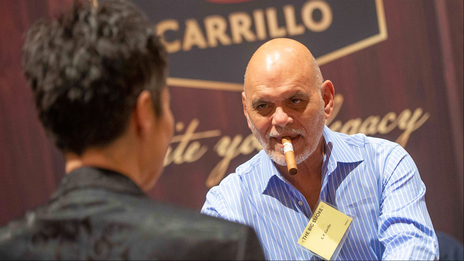 Cigarmaker Ernesto Perez-Carrillo greets fans at the E.P. Carrillo booth.